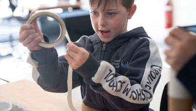 Student using masking tape