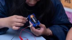 Student working with circuit
