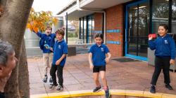 Students play in a playground