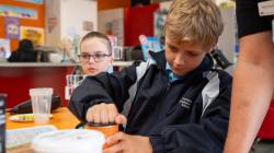 Student assembling something