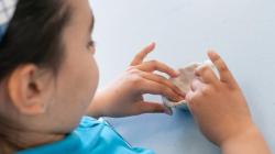 Student works with clay